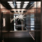 Internal elevator branding for PM Group